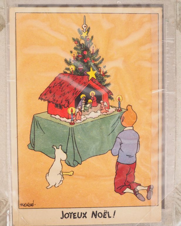 Tintin et Milou recueillis devant la crèche Tintin et Milou recueillis devant la crèche